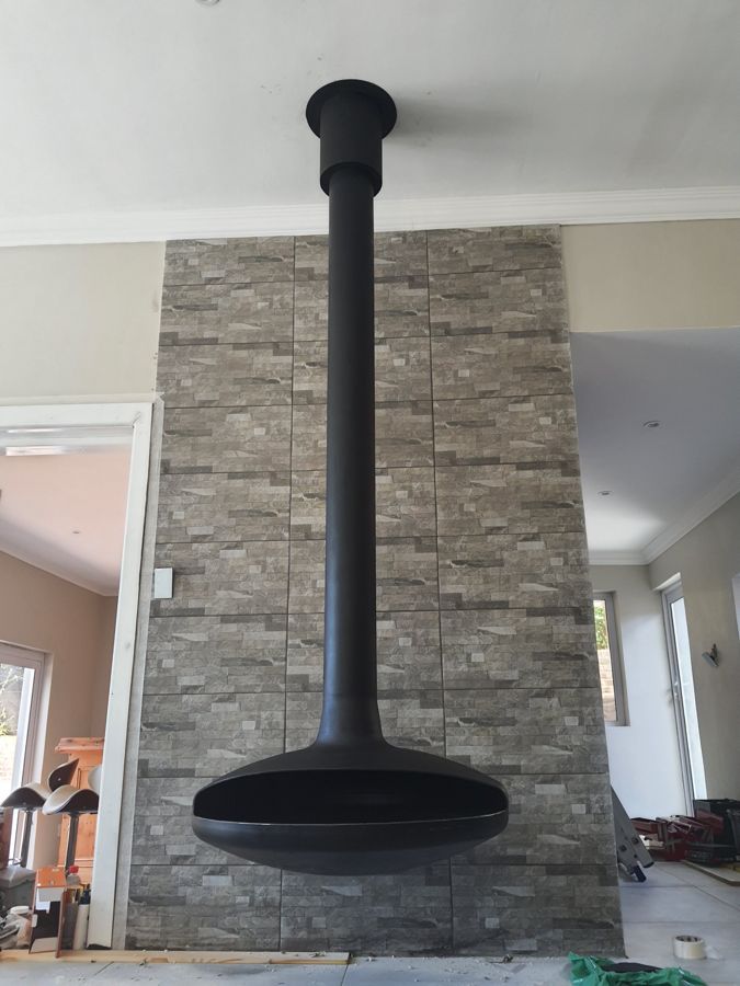Suspended fireplace and flue